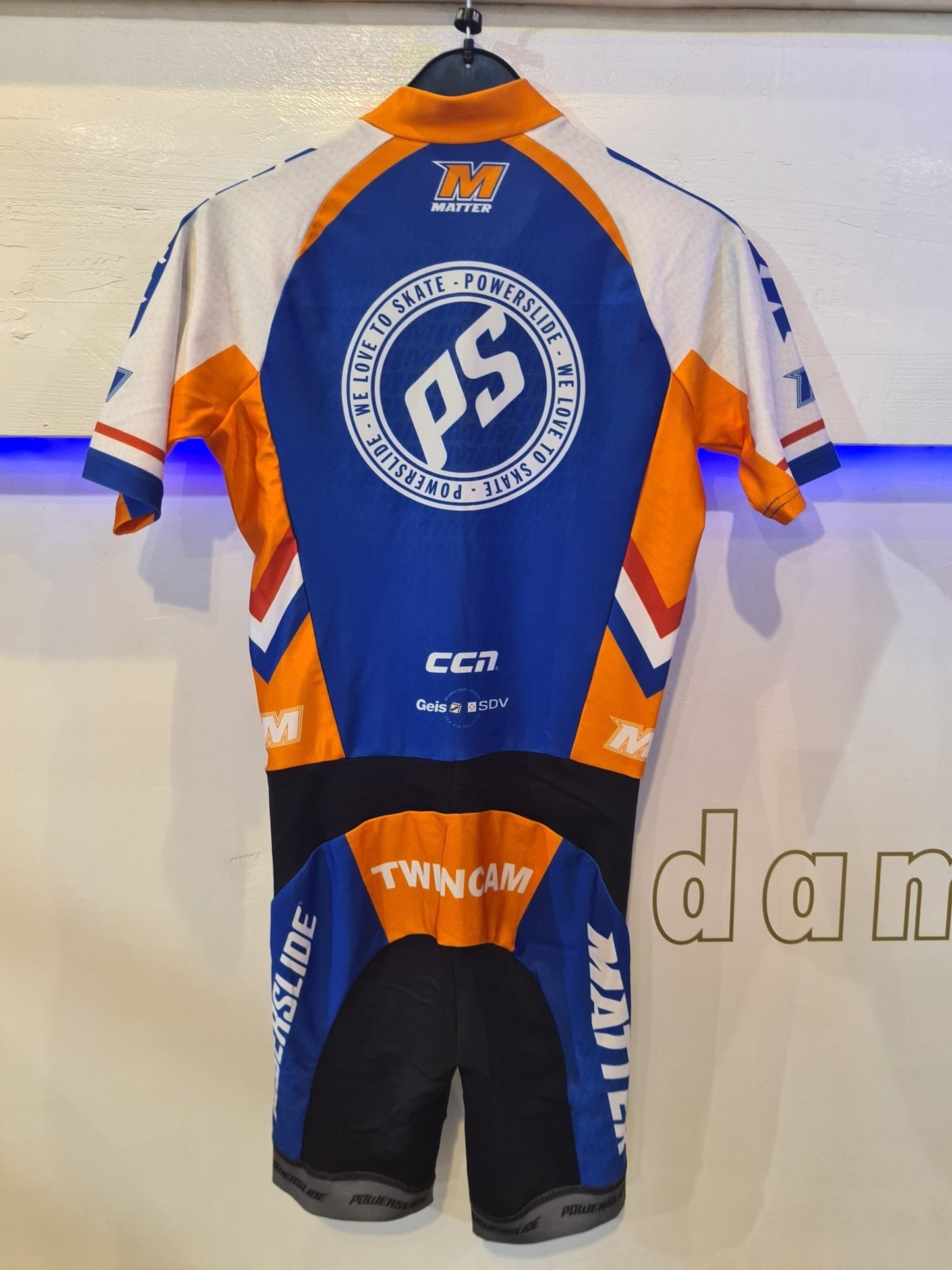 Powerslide Matter Ccn Blauw/Oranje Skeeler racing suit - Damplein 9 SKI & Fashion
